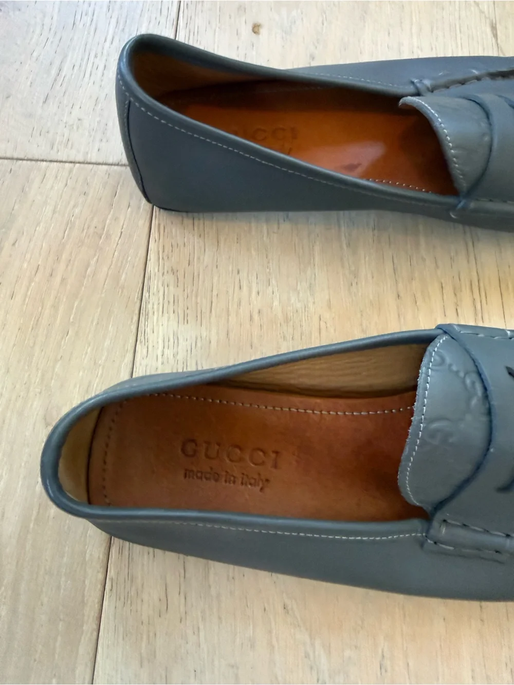 Gucci embossed gg